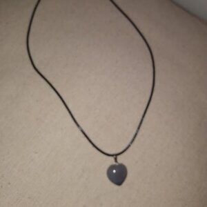 Gray heart shaped stone pendant necklace.